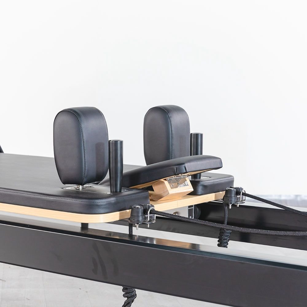 Structure et ressorts sous le chariot du reformer AB04